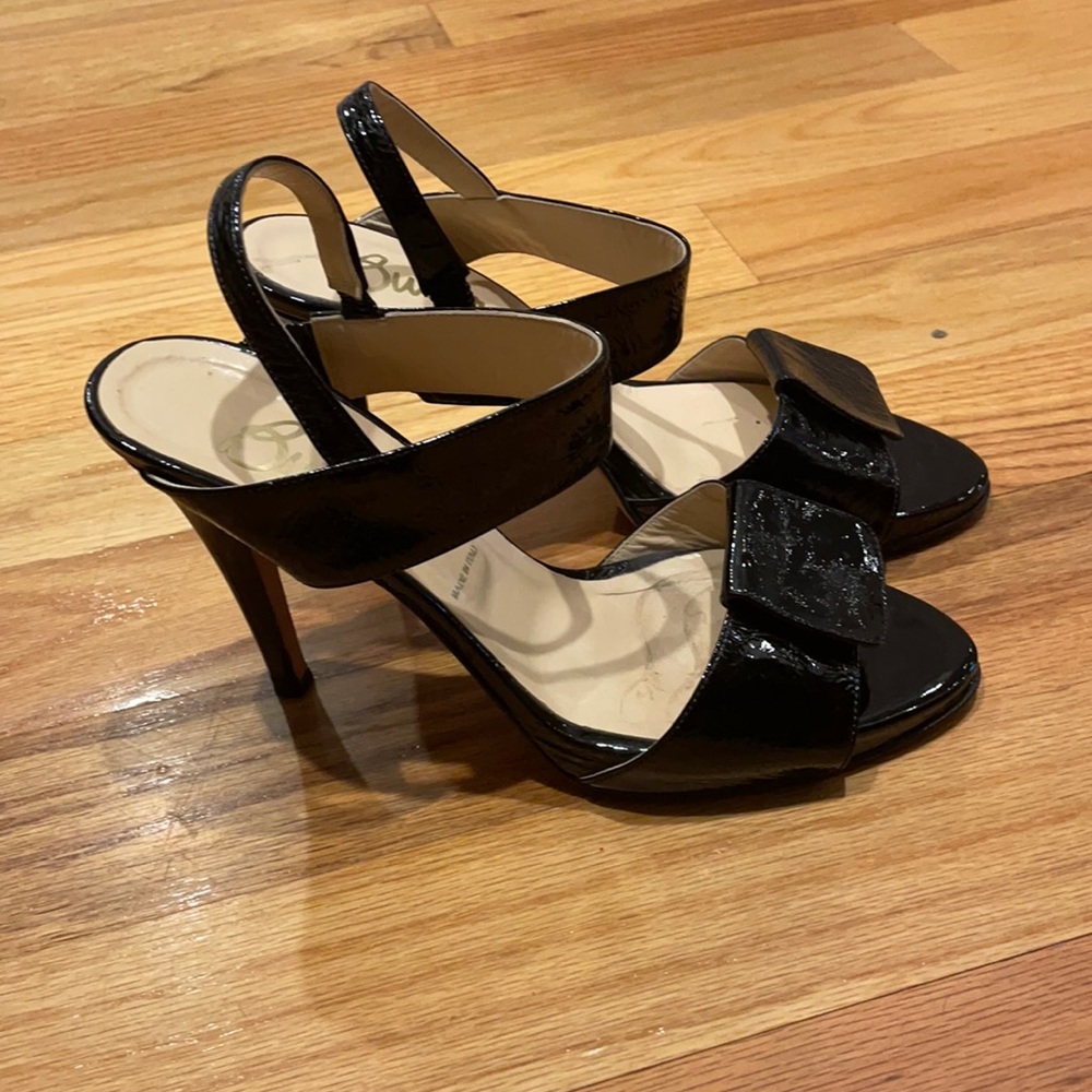 Butter patent leather sandal.